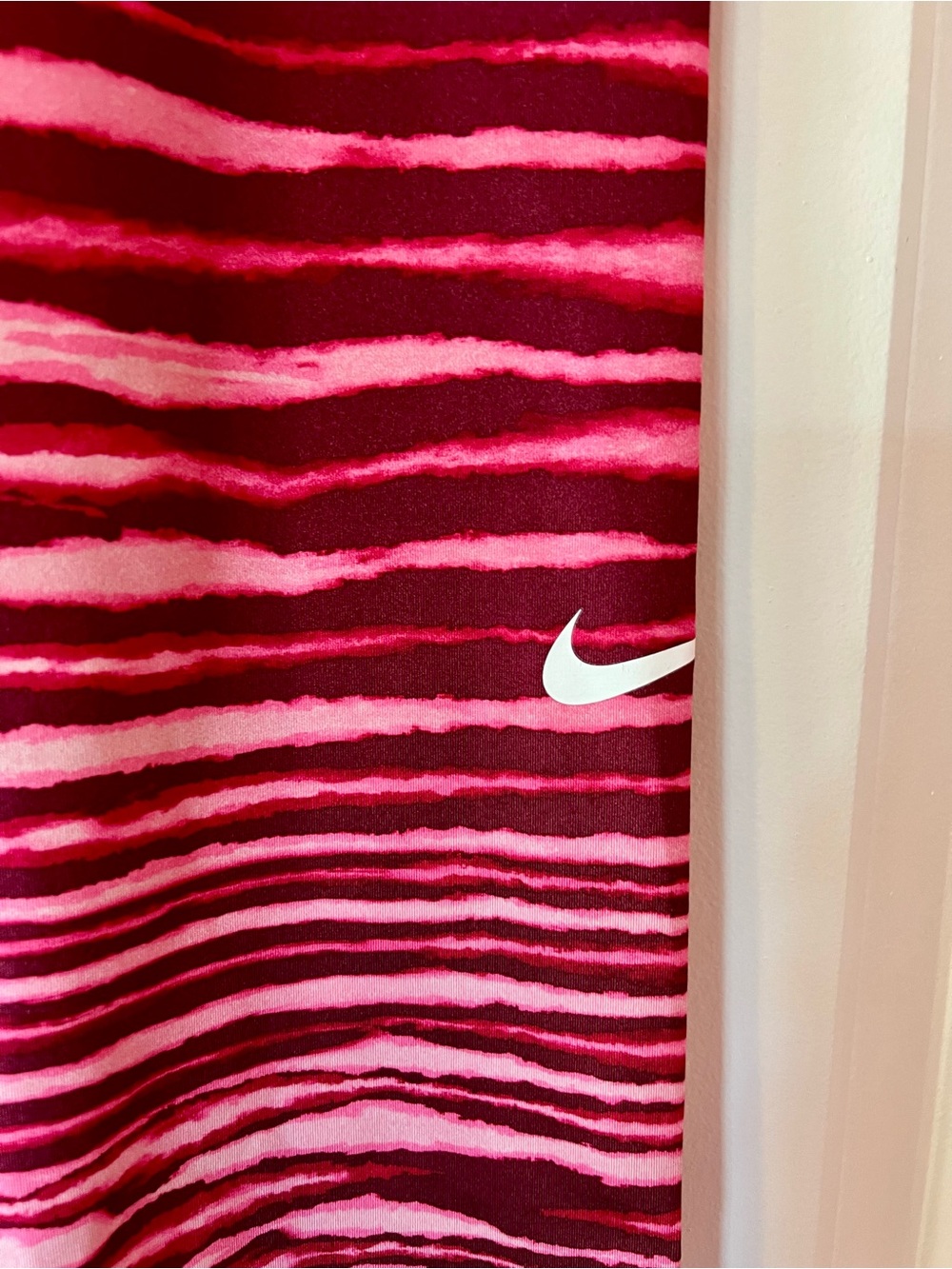 Nike Pink and Red Striped Women’s Capri Leggings - Picture 2 of 4